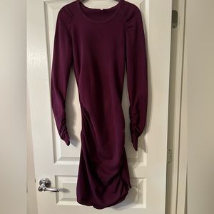 Burgundy, long sleeve, side ruched, sweater dress. Knee length by VS.
